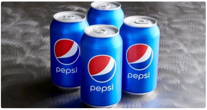 Assorted canned and bottled beverages served chilled