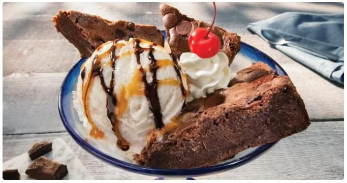 freshly prepared dessert with chocolate drizzle.