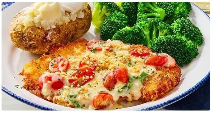 Traditional classic meal dishes arranged on plates.