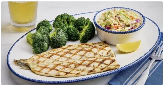 famous classic restaurant meals on a dining table.